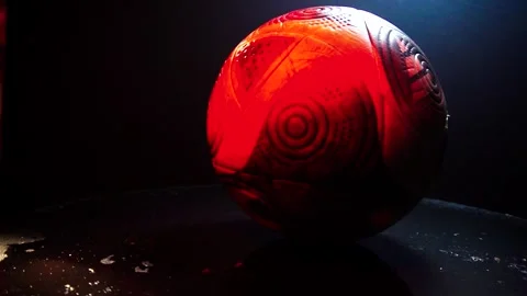 Soccer ball in water splashes rotating 360 degrees 스톡 동영상 331283021