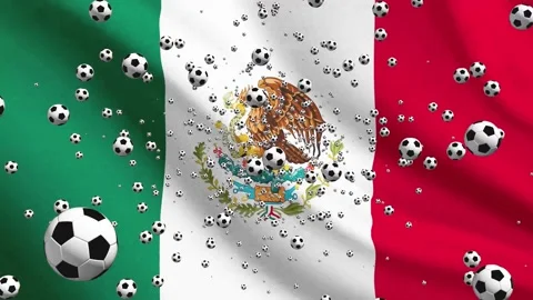 Soccer balls float through the air in front of the Mexican flag during a sp.. Video stock 335453748