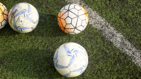 Soccer balls on the grass. Stock Footage 124656621