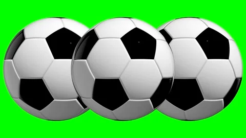 Soccer balls rolling on green background during play in a sports event 動画素材 335267710