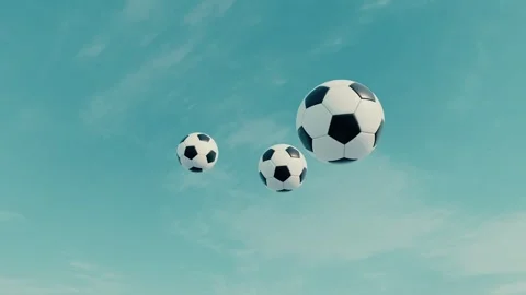 Soccer balls thrown into blue sky background Stock Footage 330248796