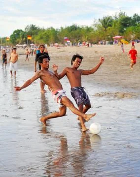 Soccer on the beach Stock Photos