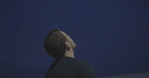 Soccer Coach At Night Practices Heading Ball Stock Footage 94414570