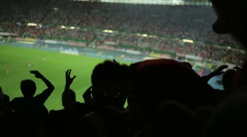 Soccer fans in stadium after a missed goal Stock Footage