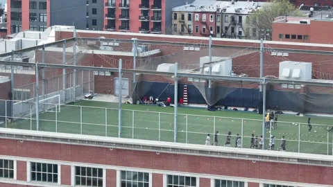 Soccer Feild Top Floor Building Urban Area people practicing Vídeos de archivo 272168225