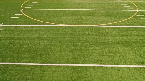 Soccer field top straight down aerial shot zoom out. Empty football playgroun Video stock 219274640