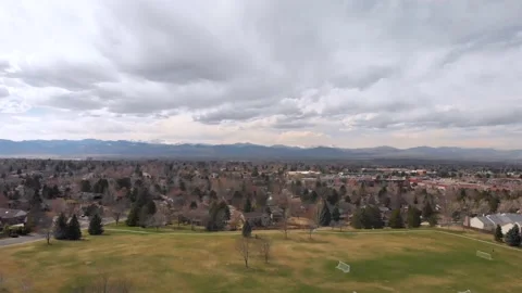 Soccer Fields and Mountains on Cloudy Day • Arapahoe County in Colorado Video stock 219461237