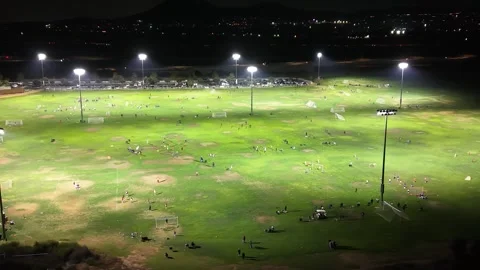Soccer fields at night pan shot Видео 326644398