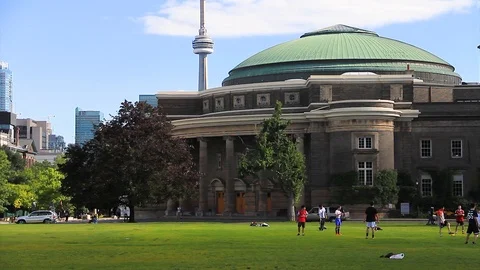 Soccer game set to the backdrop of University of Toronto. Stock Footage 93217880