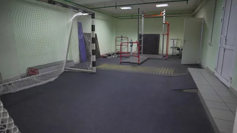 Soccer gate and exercising bars set in rehab hospital gym Stock Footage 313830230
