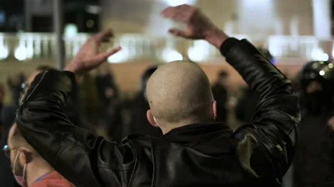 Soccer hooliganism problem. Massive after football match gathering with skinhead Stock Footage 156749670