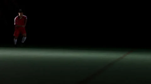 A soccer player approaching a defender and getting past him Stock Footage 33867645