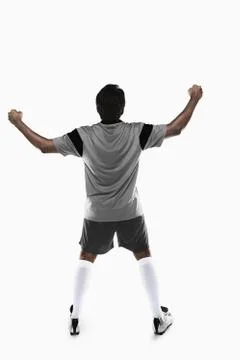 A soccer player cheering Stock Photos