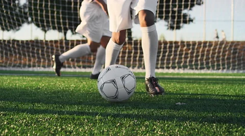 A soccer player does some fancy footwork while dribbling down the field Video stock 56149356