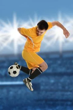 Soccer player doing back kick Stock Photos