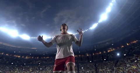 Soccer player in dramatic play during a soccer game Stock Footage 77548206