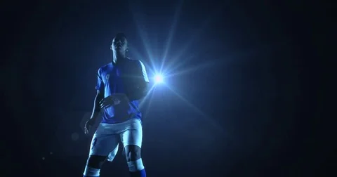 Soccer player in dramatic play during a soccer game Stock Footage