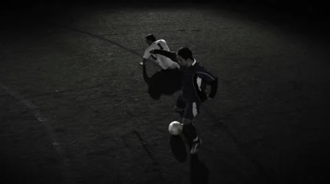 A soccer player dribbles the ball through multiple defenders in slow motion Stock Footage 34007635