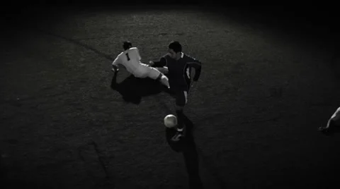 A soccer player dribbles the ball through multiple defenders Stock Footage 34007646