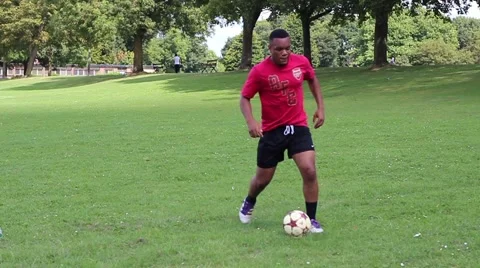 Soccer player dribbles Stock Footage