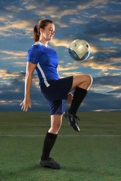 Soccer Player at Dusk Stock Photos