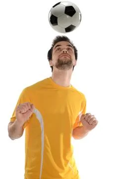 Soccer player heading ball Stock Photos