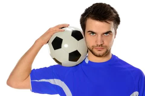 Soccer player holding ball Stock Photos