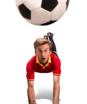 Soccer player jumping for a header the isolated on white Stock Photos