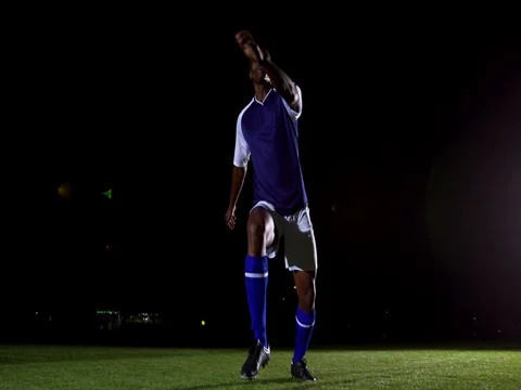 Soccer player kicking the ball 4k Stock Footage