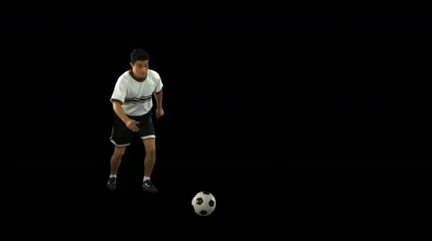 Soccer Player kicking forward Stock Footage 754466