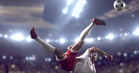Soccer player is making a strong kick Stock Footage 77060725