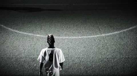 A soccer player passes the ball to his mate Stock Footage 34009072