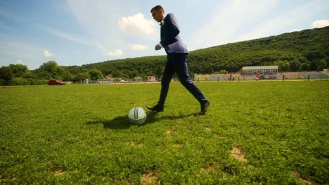 Soccer player playing with ball on field. Wide angle. Stock Footage 95561752