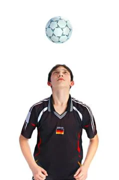 Soccer player playing ball Stock Photos