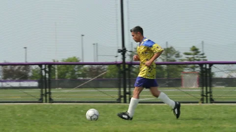 Soccer player practicing Stock Footage 6114565