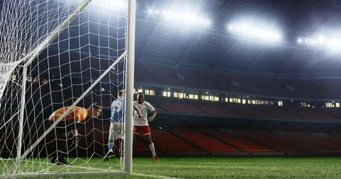 Soccer player scores a goal on the empty soccer stadium Stock Footage 126534352