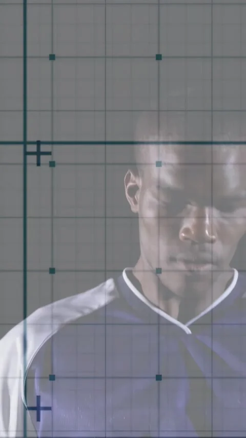 Soccer player shifting up while tracking ball, readying header, grid markers Stock Footage 330655546