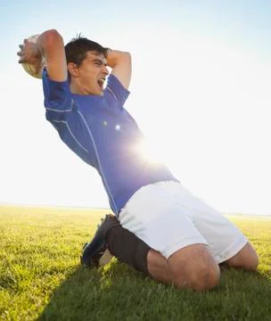 Soccer player throwing ball Stock Photos
