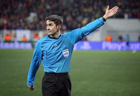 Soccer referee in action Stock Photos