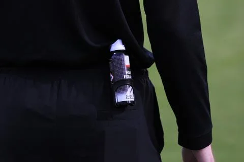 Soccer referee with a spray Stock Photos