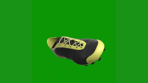 Soccer shoe green background screen yellow black object pair shoes ball helmet 스톡 동영상 314064992