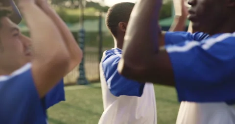 Soccer, team and high five of men with success, celebration and sport win on Stock Footage 287285030