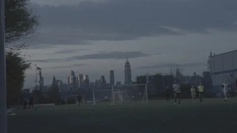 Soccer Team Practicing With NYC Skyline In Background 2 - 4K - RAW Stock Footage 238794907