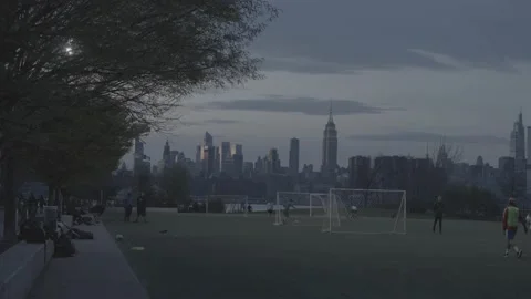 Soccer Team Practicing With NYC Skyline In Background 1 - 4K- RAW Stock Footage 238794932