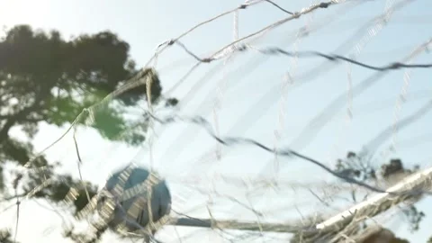 Soccerbal hitting the back of the net in slow motion Stock Footage 339545121