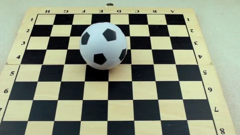 Soccerball on a chessboard Stock Footage 78738355