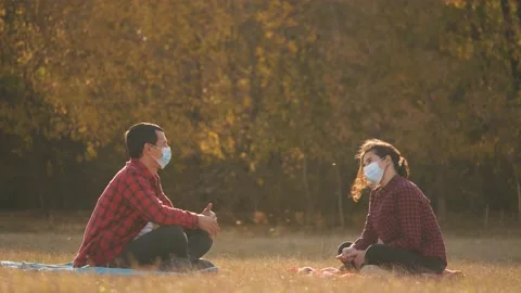 Social distance. Remote communication between people wearing safety masks Stock-Footage 140559911
