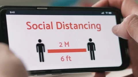 Social Distancing Concept Animation Shown on a Smartphone Video stock 132042253