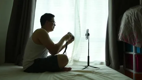 Social distancing concept by man use vdo call happy talking with girlfriend Video stock 132052124