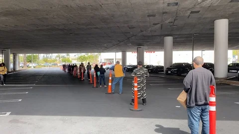 Social Distancing on front of store during CoronaVirus quarantine period Stock Footage 127789003